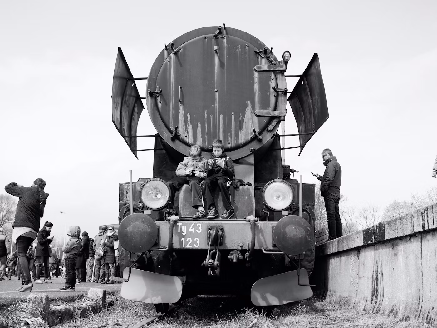 a group of people standing on a train